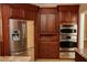 Kitchen boasting stainless steel appliances built into a custom cabinet setup at 2208 Fiero Dr, Las Vegas, NV 89134