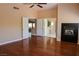 Main bedroom with a fireplace, neutral walls, hardwood floors and an ensuite bathroom at 2208 Fiero Dr, Las Vegas, NV 89134