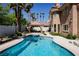 Beautiful backyard pool with covered patio area perfect for outdoor entertaining at 2208 Fiero Dr, Las Vegas, NV 89134