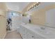 Bright bathroom with double sinks, shower/tub combination and lots of counter space at 2417 Chestnut Hill St, Las Vegas, NV 89134