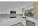 Bright kitchen featuring white cabinets, stainless steel appliances and ample counter space at 2417 Chestnut Hill St, Las Vegas, NV 89134