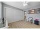 This bedroom features natural light, laminate floors, and ample closet space for your convenience at 2430 Sungold Dr, Las Vegas, NV 89134