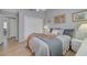 Comfortable main bedroom with neutral tones, soft lighting, and a closet for ample storage at 2430 Sungold Dr, Las Vegas, NV 89134
