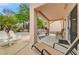 This patio is perfect for outdoor relaxation and entertainment, with a built in swing and patio furniture at 2430 Sungold Dr, Las Vegas, NV 89134