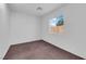 Bedroom featuring carpet floors and a window with a view at 2432 Shady Hill Ave, Las Vegas, NV 89106