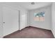 Bedroom with a window and a closet with sliding doors at 2432 Shady Hill Ave, Las Vegas, NV 89106
