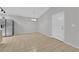 Open dining area featuring tile floors and contemporary chandelier at 2432 Shady Hill Ave, Las Vegas, NV 89106