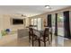 Dining area featuring a table with chairs and a view of the backyard at 2621 Rainbow Glow St, North Las Vegas, NV 89030