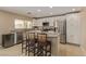 Well-lit kitchen featuring stainless steel appliances and a center island at 2621 Rainbow Glow St, North Las Vegas, NV 89030