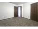 Bedroom featuring neutral carpet, and a closet at 2761 Carnation Ln # 1, Henderson, NV 89074