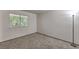 Bedroom with carpet, a window with horizontal blinds, and a floor lamp at 2761 Carnation Ln # 1, Henderson, NV 89074
