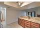 Kitchen with granite counters and stainless steel refrigerator at 2761 Carnation Ln # 1, Henderson, NV 89074