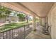 Relaxing patio overlooking a well-maintained lawn with mature trees at 2761 Carnation Ln # 1, Henderson, NV 89074