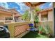 Charming balcony with colorful plants, cozy seating, and a sunny view at 2925 Wigwam Pkwy # 123, Henderson, NV 89074