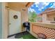 Cozy balcony featuring outdoor seating and charming neighborhood views at 2925 Wigwam Pkwy # 123, Henderson, NV 89074