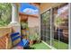 Inviting balcony with plants, comfortable seating, and view of the neighborhood at 2925 Wigwam Pkwy # 123, Henderson, NV 89074