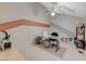 Well-lit office space with neutral tones, a comfortable chair, and a geometric accent wall at 2925 Wigwam Pkwy # 123, Henderson, NV 89074