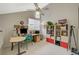 Bright home office featuring large desk, a ceiling fan, and ample storage space at 2925 Wigwam Pkwy # 123, Henderson, NV 89074