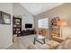 Comfortable living room featuring neutral walls, lots of light and stylish decor at 2925 Wigwam Pkwy # 123, Henderson, NV 89074
