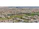 An aerial view of a residential community featuring well-kept homes, green baseball fields, and open spaces for recreation at 2940 Duverney Ave, Henderson, NV 89044