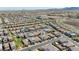 A panoramic aerial view captures a community with a variety of modern homes, mature trees, and well-planned streetscapes at 2940 Duverney Ave, Henderson, NV 89044