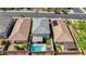Aerial view of backyard with a private pool, patio, and green space, ideal for outdoor living at 2940 Duverney Ave, Henderson, NV 89044