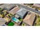 Aerial view of backyard with a private pool, patio, and green space, ideal for outdoor living at 2940 Duverney Ave, Henderson, NV 89044