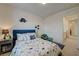 bedroom featuring dinosaur themed bed and decor and natural lighting at 2940 Duverney Ave, Henderson, NV 89044