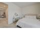 Bright bedroom boasting a comfortable bed, vanity, and access to a playroom at 2940 Duverney Ave, Henderson, NV 89044