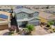 Charming two-story home with a well-manicured front yard and a two-car garage at 2940 Duverney Ave, Henderson, NV 89044