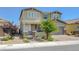 Charming two-story home featuring a manicured front yard and a spacious two-car garage at 2940 Duverney Ave, Henderson, NV 89044