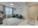 Cozy living room with natural light, neutral colors, and comfortable seating at 2940 Duverney Ave, Henderson, NV 89044