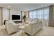 Spacious living room with comfortable seating, entertainment center, and bright, airy ambiance at 2940 Duverney Ave, Henderson, NV 89044