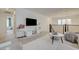 Upstairs living room features comfortable seating, entertainment center, and access to bedroom at 2940 Duverney Ave, Henderson, NV 89044