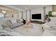 Bright living room featuring plush sofas, a modern TV, and an open layout at 2940 Duverney Ave, Henderson, NV 89044
