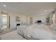 Light-filled primary bedroom featuring a fireplace, a desk, and neutral decor at 2940 Duverney Ave, Henderson, NV 89044