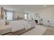 Light-filled main bedroom featuring a fireplace and a neutral color palette at 2940 Duverney Ave, Henderson, NV 89044