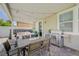 Inviting covered patio features a stainless steel grill, outdoor seating, and stylish decor elements at 2940 Duverney Ave, Henderson, NV 89044