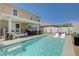 Spacious backyard offers a pristine pool, covered patio, and comfortable outdoor dining, ideal for entertaining at 2940 Duverney Ave, Henderson, NV 89044