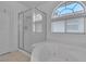 Bright bathroom featuring a shower, tub with jets, and a window for natural light at 3544 Mountain Valley Dr, Las Vegas, NV 89129
