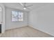Light and airy bedroom with new flooring and a ceiling fan at 3544 Mountain Valley Dr, Las Vegas, NV 89129