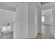 Upstairs hallway with wood flooring and natural light at 3544 Mountain Valley Dr, Las Vegas, NV 89129