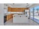 Well-lit kitchen featuring an island, stainless steel appliances, and ample counter space at 3544 Mountain Valley Dr, Las Vegas, NV 89129