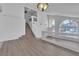 Open living space with stairway, large windows, and modern, light-colored flooring at 3544 Mountain Valley Dr, Las Vegas, NV 89129