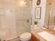 Clean bathroom with a glass door shower and granite countertop sink at 391 Newbury Ct, Henderson, NV 89015