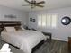 Cozy bedroom featuring a ceiling fan and a comfortably arranged bed at 391 Newbury Ct, Henderson, NV 89015