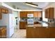 The kitchen offers lots of counterspace, modern appliances, and an eat-in breakfast bar at 4021 Broadriver Dr, Las Vegas, NV 89108