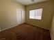 Bedroom features carpet, a window with blinds and a double-door closet at 416 Richgold St, Henderson, NV 89012