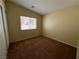 Bedroom features carpet, a window with blinds and neutral paint at 416 Richgold St, Henderson, NV 89012