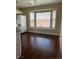 Cozy breakfast nook with bay window overlooking the backyard and hardwood floors at 416 Richgold St, Henderson, NV 89012